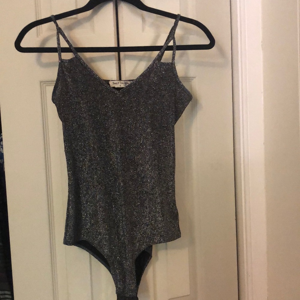 Glittery sparkly bodysuit with snap closure!